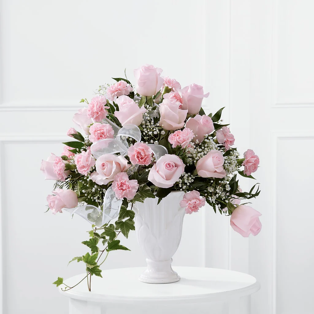 Sympathy arrangement by Kevin's Flowers